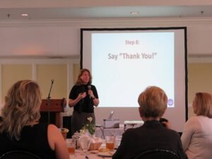 Female HR Consultant giving a presentation to women