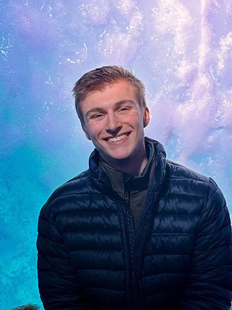 Young HR Intern smiling on a sunny day